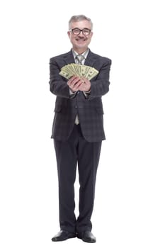 in full growth. smiling man with banknotes. isolated on a white background