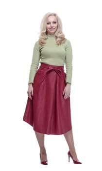 in full growth. an attractive young woman in a red skirt. isolated on a white background