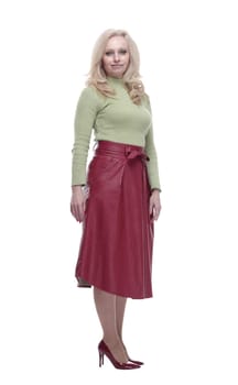 in full growth. attractive young woman in red skirt looking at the camera. isolated on a white