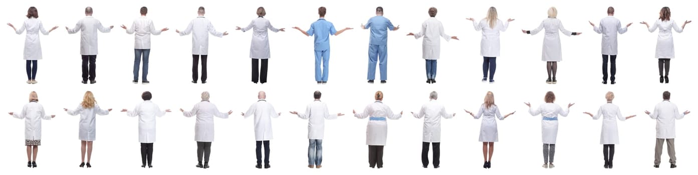 group of doctors standing with their backs isolated on white background