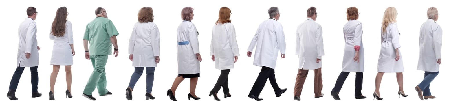 group of doctors in motion isolated on white background