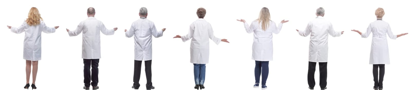 group of doctors standing with their backs isolated on white background