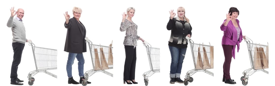 group of people in profile with shopping cart isolated on white background