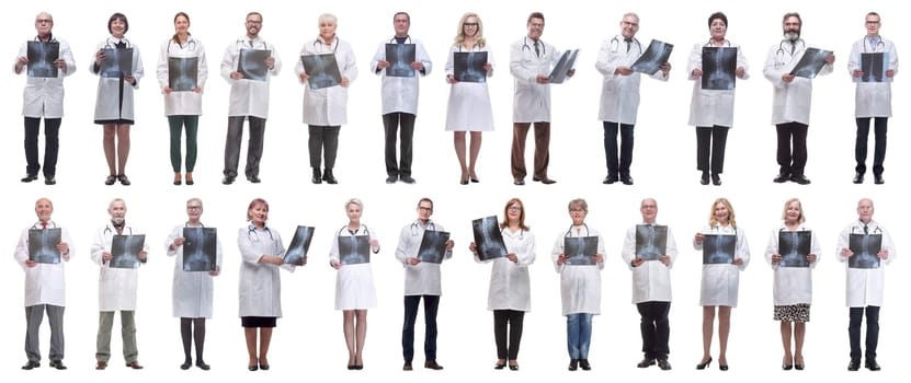 group of doctors holding x-ray isolated on white background