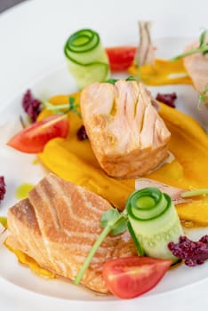 Smoked salmon on stone table in fine dining restaurant