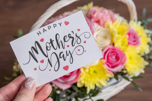 May mothers day handmade giftbox wishes photography - Beautiful blooming carnations with pink ribbon box isolated on fair-faced gray background desk, close up, copy space, mock up