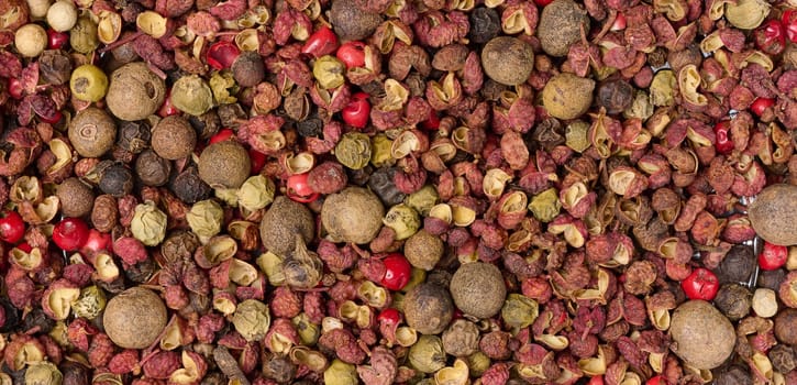 Various mixture of peppers, red, black and allspice. Seasoning for cooking