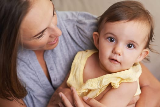 Mother and baby bond. Portrait of an adorable little baby and her mother sharing a cute moment