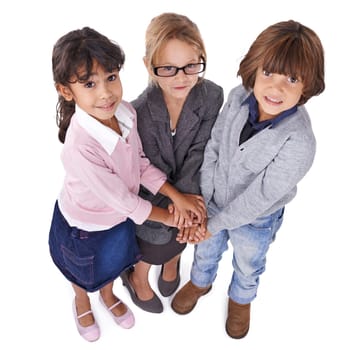 Friends forever. Three friends standing with their hands piled up and looking at the camera