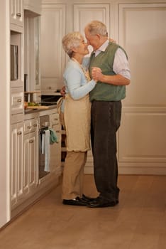 He knows how to romance a woman...Full-length shot of an elderly couple holding hands