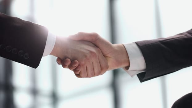 Handshake is symbol of starting finishing negotiations, successful teamwork signing contract, hiring human resource concept