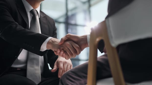 Handshake is symbol of starting finishing negotiations, successful teamwork signing contract, hiring human resource concept