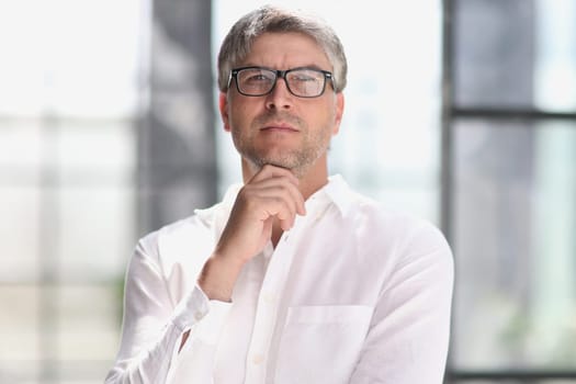 portrait of a successful business man. businessman smiling and looking at camera