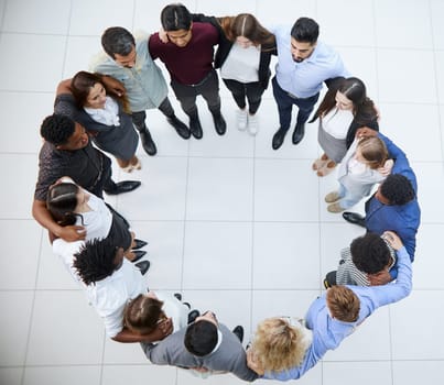 top view .a large group of diverse young people standing in a circle