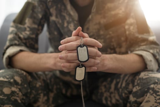 Soldier sitting and talking to his therapist.