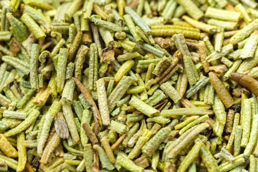 Dry spice rosemary close-up. Spices and herbs for cooking, macro view.