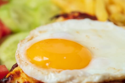 Breakfast. French cuisine. Croque madame sandwich close up on the table. High quality photo