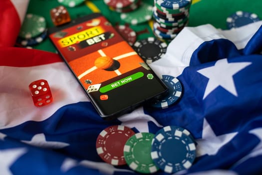 smartphone with sports betting, casino, flag of the USA.