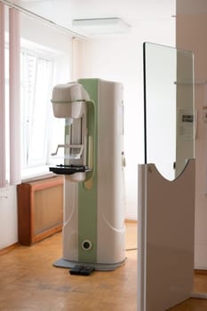 Mammography breast screening device in hospital laboratory of modern clinic. Selective focus