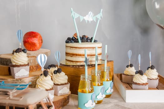 Buffet with sweets. Sweet, colorful cupcakes. Sweet table for banquets, weddings, parties Candy bar