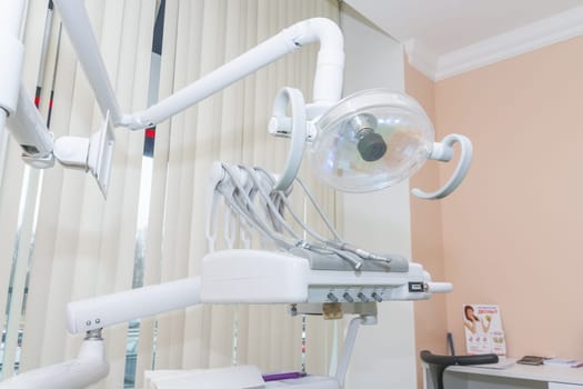 Dental office with dental chair. dental clinic office to treat patients with orthodontics. teeth care concept