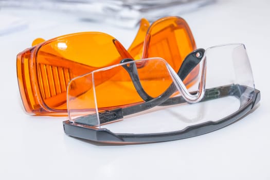 collection of safety glasses for patient other, health equipment to prevent cross infection. Dentist clinic. protective glasses.