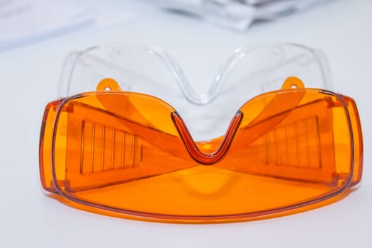 collection of safety glasses for patient other, health equipment to prevent cross infection. Dentist clinic. protective glasses.