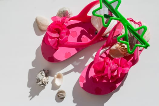summer pink Shoes for kids, Children's slippers, beach fashion for baby, Colorful of Sandals shoes and sun glasses, holiday concept