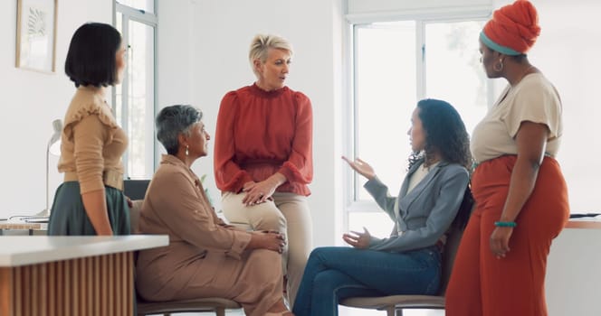 Business women, diversity and conversation with collaboration and business meeting with team in workplace. Business people, talking and listening with teamwork, communication and team building.