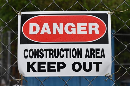 Danger Construction Area Keep Out Sign on Fence. High quality photo