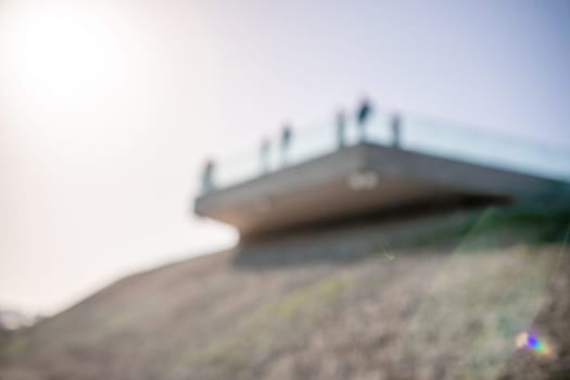 Panoramic view of the city. An observation deck with a figured fence and a lantern. City view.