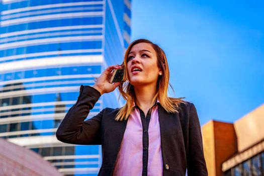 Modern portrait of a young professional business woman.