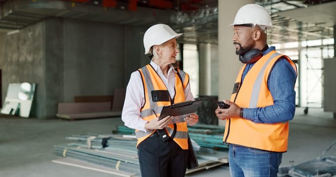 Construction, inspection and clipboard, black man and woman discussion, construction site with scaffolding and building renovation checklist. Contractor with inspector, engineering and communication