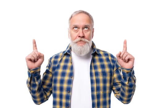 handsome 50s elderly gray-haired man with beard showing thumbs up on white background.