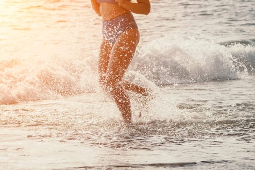 Running woman. Female runner jogging during the sunrise on beach. Woman Runner feet running on the beach at sunrise. woman fitness sunrise jog workout wellness concept.