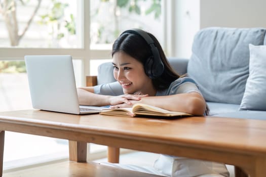 woman cheery happy positive cute beautiful business woman sit indoors in using laptop computer.