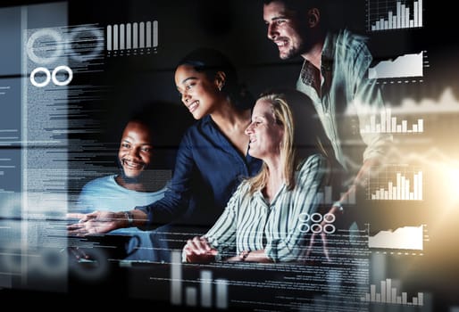 Shot of a group of programmers working together on a computer code at night.