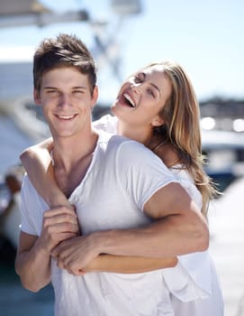 Happiness, love and portrait of couple on a date together feeling happy on a romantic vacation or holiday in summer. Portrait, travel and woman hug man in a relationship and smile outdoor with care.