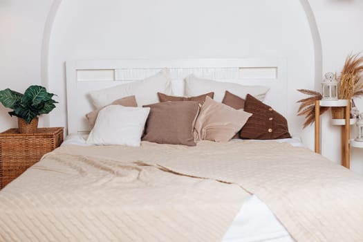 Home bedroom closeup, plant flower pot near bed. Room natural decoration at house interior, nobody at modern apartment.