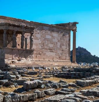 ATHENS, GREECE - 06/23/2013 - panoramic background with Acropolis, porch of caryatids, Erechtheum Temple in Athens, Greece