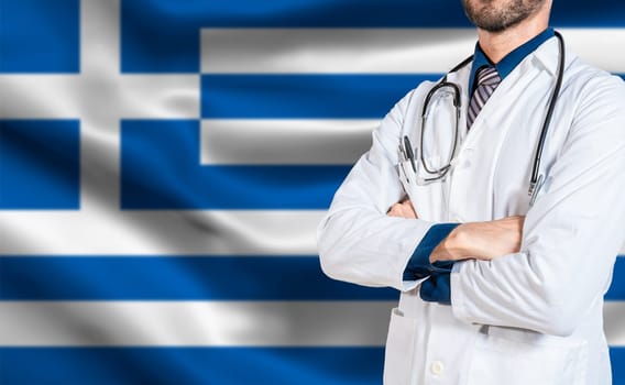 Doctor arms crossed with stethoscope over greece flag. Health and care with flag of greece, Concept of national health of greece