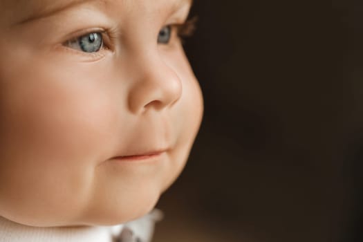 Close-up of a cheerful little boy in the background.