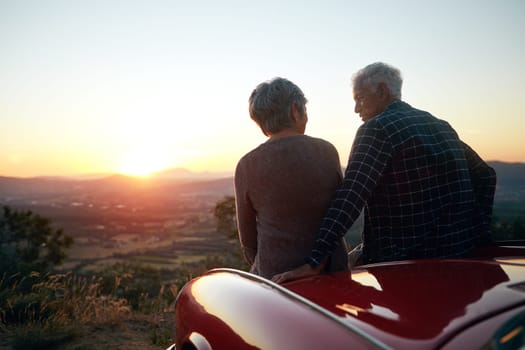 Nothing like travel to enrich your life. a senior couple enjoying a road trip
