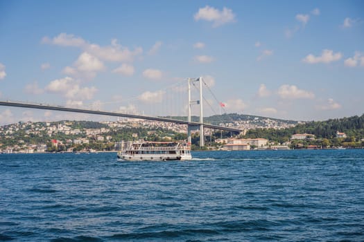 Bosphorus bridge on a summer sunny day, view from the sea, Istanbul Turkey.