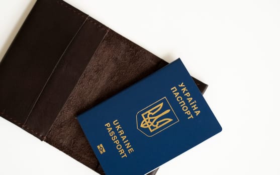 Ukrainian biometric passport id with a genuine leather cover on a white background