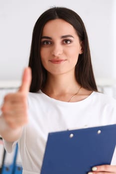 Businesswoman offer hand to shake as hello in office closeup. Serious business friendly support service excellent prospect introduction or thanks gesture gratitude invite to participate concept