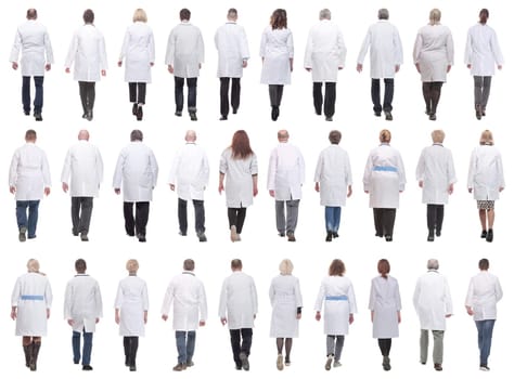 group of doctors in motion isolated on white background