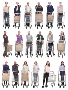 group of people with shopping cart showing thumbs up at camera isolated on white background