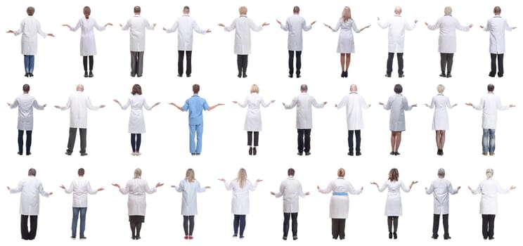 group of doctors standing with their backs isolated on white background