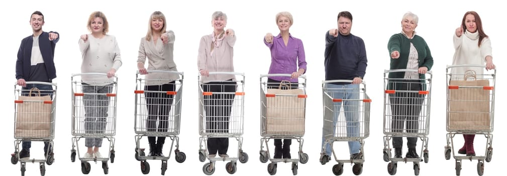 group of people with shopping cart showing thumbs up at camera isolated on white background
